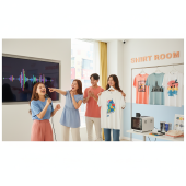 Group of travellers enjoying singing inside a shirt room